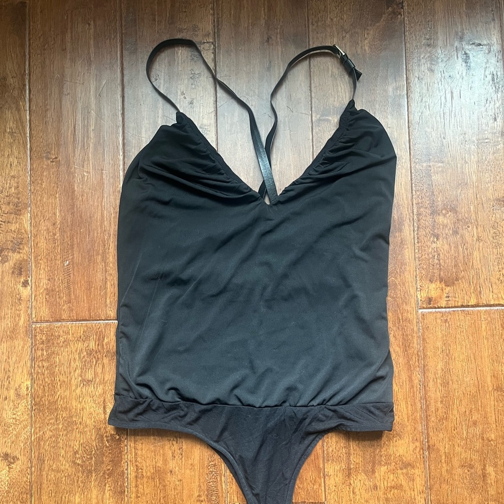 Bebe black strappy crossback bodysuit Size M